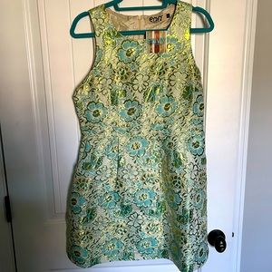 Shiny green/blue/cream floral dress with pockets. Size L.